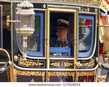 LONDON - UK, MAY 08: Queen Elizabeth II and Prince Philip leaving Buckingham Palace and going to the State Opening of Parliament on May 8, 2013 in London.