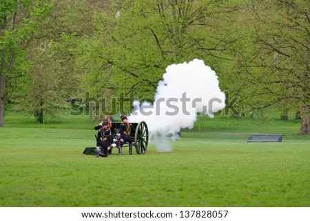 LONDON - UK, MAY 08: The King\'s Troop in Green Park are firing gun salutes for the State Opening of Parliament on May 8, 2013 in London.