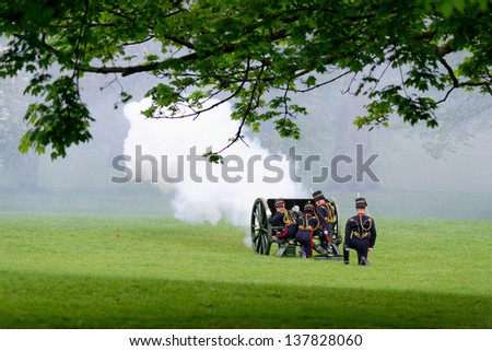 LONDON - UK, MAY 08: The King's Troop in Green Park are firing gun salutes for the State Opening of Parliament on May 8, 2013 in London.