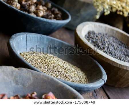 Herbs and spices in bowls used in ayurvedic medicine
