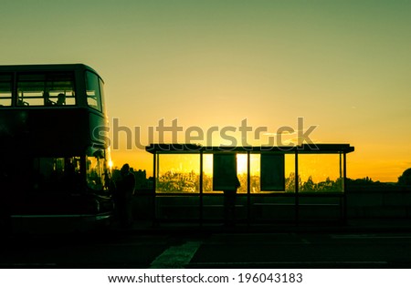 Bus stop at sunset in London, UK