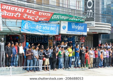 KATHMANDU, NEPAL - AUGUST 3, 2014: The crowd waits for Indian Prime Minister Narendra Modi who arrives in Kathmandu on a 2-day official Nepal visit.
