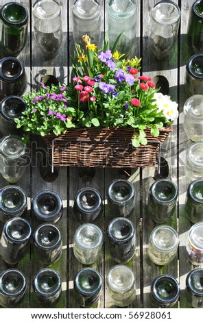 Empty Champagne bottles and flowers