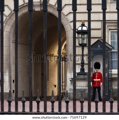 LONDON, UK - APRIL 20: A royal guard at Buckingham Palace which will be the starting point of the royal wedding procession to be held on Friday 29th April, April 20, 2011 in London, United Kingdom