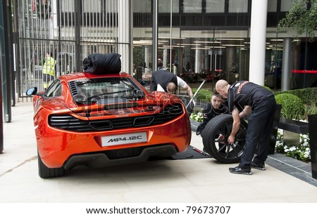 LONDON, UK - JUNE 21: The McLaren MP4-12C at the official opening of the McLaren showroom on Knightsbridge on June 21, 2011 in London, UK. The showroom opens with the official launch of the MP4-12C.