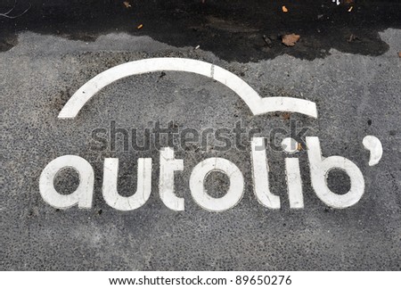 PARIS - NOVEMBER 25: An Autolib\' symbol painted on the tarmac on November 25, 2011 in Paris, France. Autolib\' is a car-sharing scheme which will be launched in December.