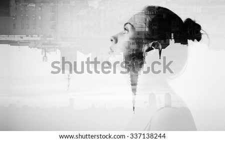 Creative double exposure with attractive girl and modern city, monochrome