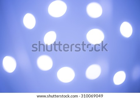 Circles of blue light abstract background. Blue blurry background. Bokeh background