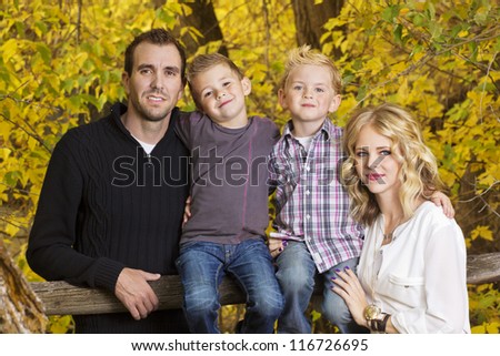 Beautiful Young Family Portrait with Fall colors