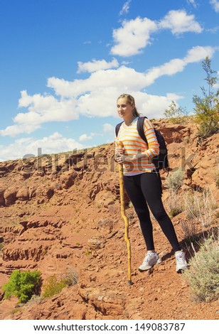 Woman Hiking in the Rugged Desert Mountains