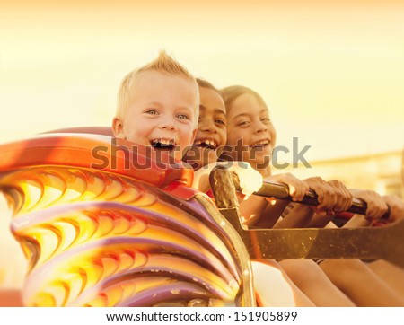 Kids On A Summertime Roller Coaster Ride