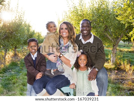 Beautiful Multi Ethnic Family Portrait Outdoors