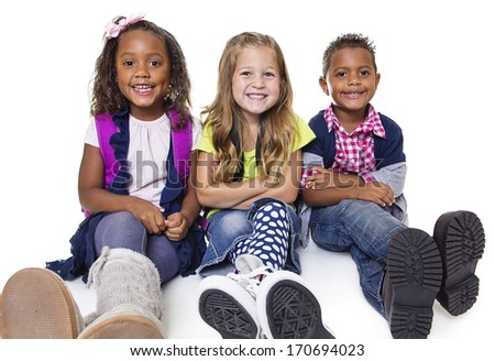 Diverse group of school kids isolated on white background. Smiling and happy children.