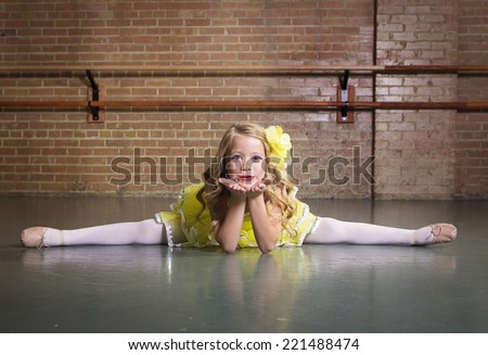 Beautiful little dancer portrait at a dance studio