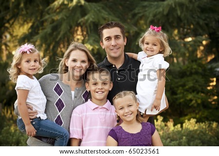 stock photo A Beautiful Young Family Portrait