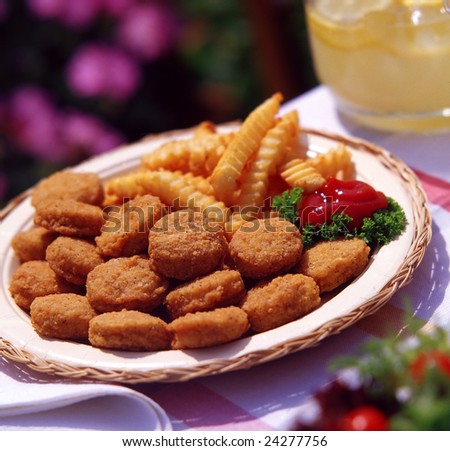 chicken nuggets and fries. stock photo : Chicken nuggets