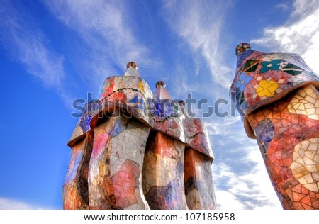 BARCELONA - FEBRUARY 18: The famous architect GaudiÂ­ treated rooftop chimneys like pieces of art on the rooftop of the house Casa Batllo on February 18, 2011 in Barcelona, Spain.
