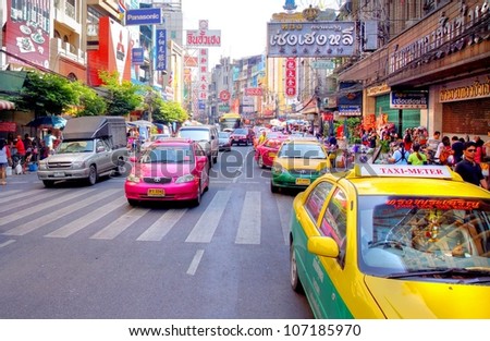 BANGKOK, THAILAND - DEC 9:Yaowarat Road,the main street in Chinatown, built by King Rama V.This crowded street winds through the bustling heart of Chinatown on December 9, 2011 in Bangkok, Thailand.
