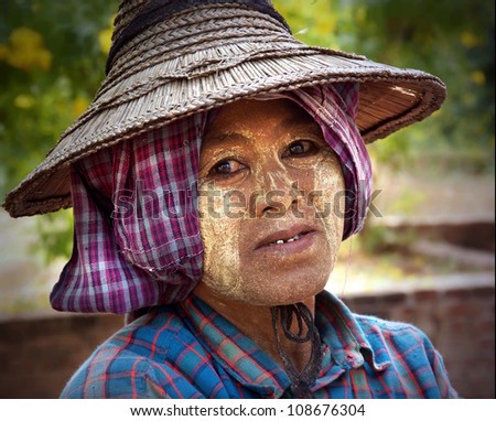 BAGAN MYANMAR NOV 17 An unidentified woman is wearing Tanaka on Nov 17 2011 in Bagan Myanmar It is a traditional whitening secret adored by females in Myanmar for more than 2000 years BAGAN MYANMAR NOV 17 An unidentified woman is wearing Tanaka on Nov 17 2011 in Bagan Myanmar It is a traditional whitening secret adored by females in Myanmar for more than 2000 years