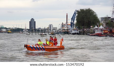 ROTTERDAM - SEPTEMBER 7, 2013: The World Port Days at the port of Rotterdam  on September 7 , 2013 in Rotterdam, Netherlands. Showing many boats on the Maasriver and around the famous Erasmus bridge.