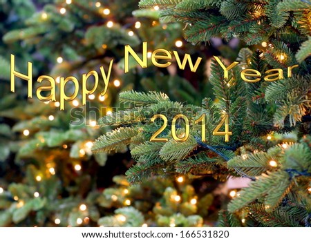 Happy New Year 2014 wish with a background of christmas lights hanging in a tree