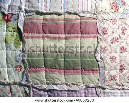 detail of a cotton quilted  blanket