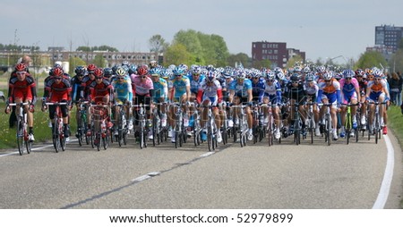 ROTTERDAM - MAY 10: Giro d\'Italia - Group of Cyclists from Various Teams During Stage 2 of the Giro d\'Italia are cycling from Amsterdam  to  Middelburg, may 10 2010 in Rotterdam, Netherland
