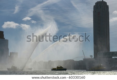 ROTTERDAM - SEPTEMBER 4: The World Port Days in the port of Rotterdam showing a impressive water ballet from water cannons on September 4 , 2010 in Rotterdam, Netherland