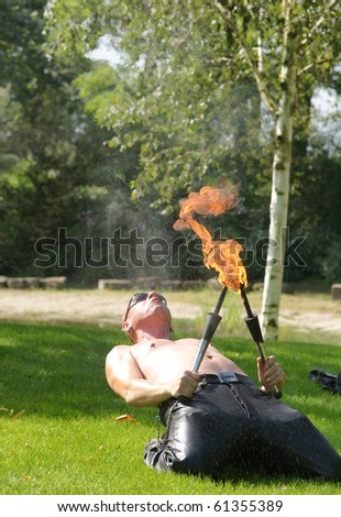 ARCEN - SEPTEMBER 18:  Fire breathing act at the Elf Fantasy Fair on september 18 , 2010 in Arcen, Netherland