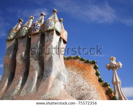 BARCELONA - FEBRUARY 18: The famous architect Gaudi­ treated rooftop chimneys like pieces of art on the rooftop of the house Casa Batllo on February 18, 2011 Barcelona, Spain