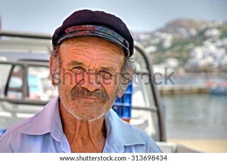 MYKONOS - GREECE ; Greek man is posing on the Island of Mykonos on 14 june 2015.The people in Greece are affraid  how the Greek debt crisis has his impact on there lives and work