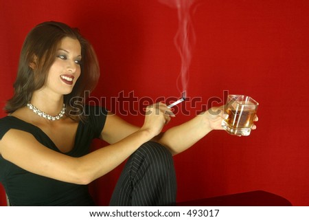Woman having a drink and a smoke.