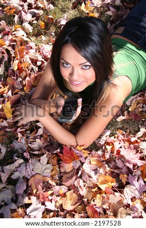 Autumn Scene Fall Woman With Cell Phone Communications Scene With Eye Appealing Model