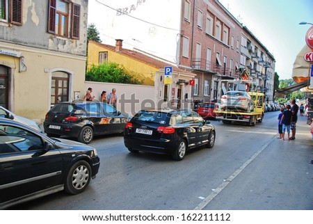 Pula, Croatia Ã¢Â?Â? August 8, 2013: Towing wrongly parked car