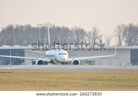 This is a view of Ryanair plane Boeing 737 8AS(WL) in special painting on the Lublin Airport. March 10, 2015. Lublin Airport in Swidnik, Poland.