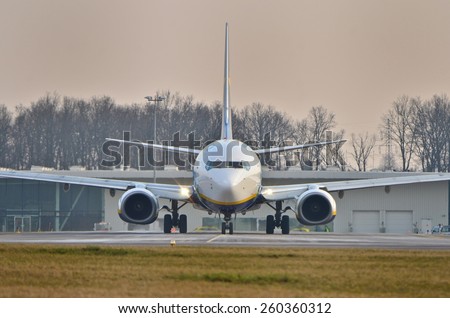 This is a view of Ryanair plane Boeing 737 8AS(WL) in special painting on the Lublin Airport. March 10, 2015. Lublin Airport in Swidnik, Poland.