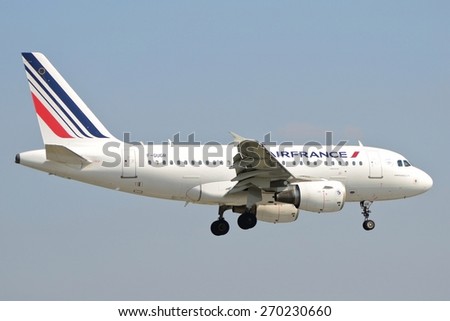 This is a view of Air France Airbus A318 registered as F-GUGR landing on Warsaw Chopin Airport. April 11, 2015. Warsaw, Poland.