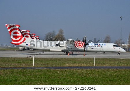 This is a view of four Eurolot planes Bombardier Q400 Dash-8 on the Warsaw Chopin Airport. Planes were parked on March 31, 2015 after the Eurolot company went bankrupt. April 11, 2015. Warsaw, Poland.