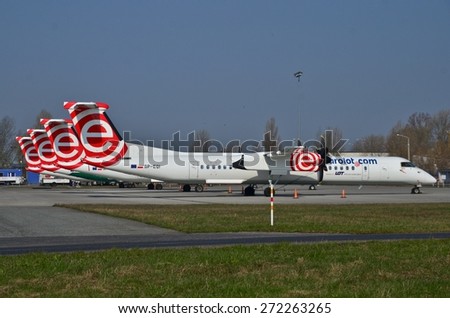 This is a view of four Eurolot planes Bombardier Q400 Dash-8 on the Warsaw Chopin Airport. Planes were parked on March 31, 2015 after the Eurolot company went bankrupt. April 11, 2015. Warsaw, Poland.