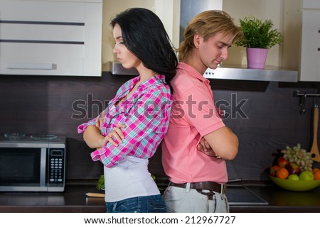 Family conflict. The young couple had a fight in the kitchen