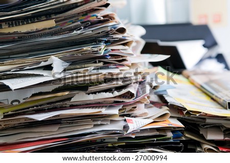 Pile of old newspapers ready for recycling