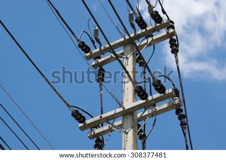 electricity post on blue sky background in a village