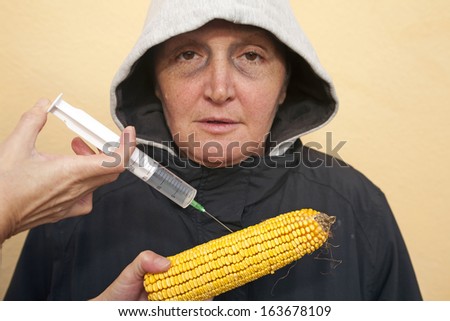 Genetically modified organism, ill woman with genetically modified corn