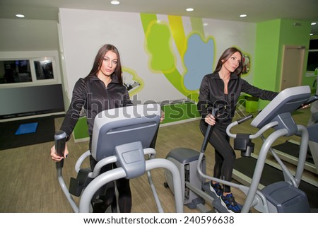 In the gym - girls are exercising in the gym