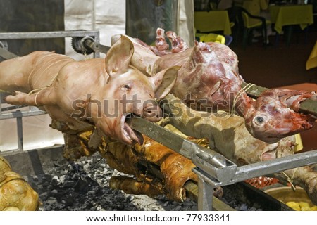 Roasted pig and lamb on the spit, traditional Serbian food