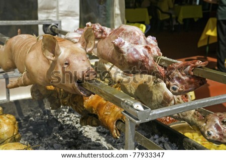 Roasted pig and lamb on the spit, traditional Serbian food