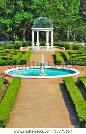 Water fountain and pavilion in a European-styled garden