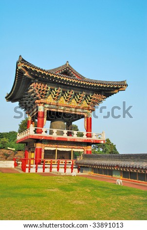 Korean-styled temple pavilion detailed architecture with blue sky background