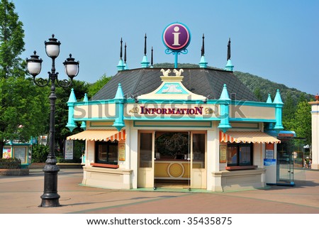 Information booth in an amusement park with classic style architecture