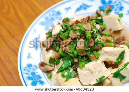 Simple, home cooked Chinese vegetarian cuisine. Ingredients include green, leafy vegetables, bean curd and mushrooms. Suitable for food and beverage, travel, healthy lifestyle, and diet and nutrition.